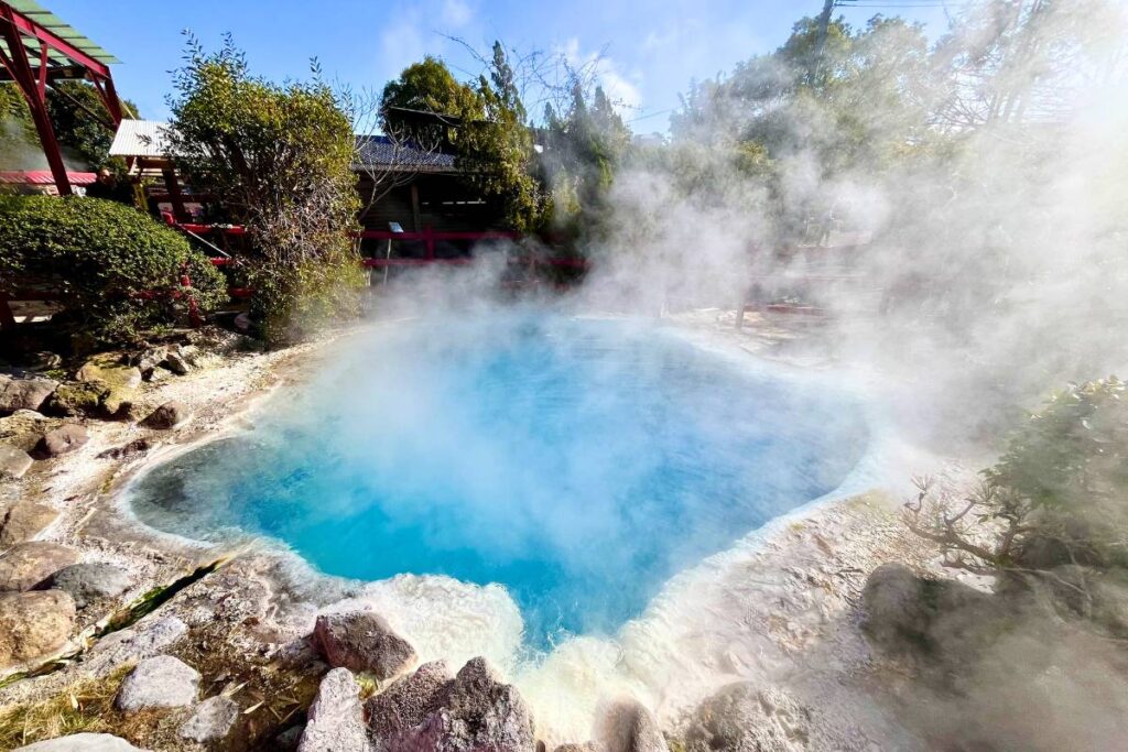 A small, bright-blue onsen at the Hells of Beppu
