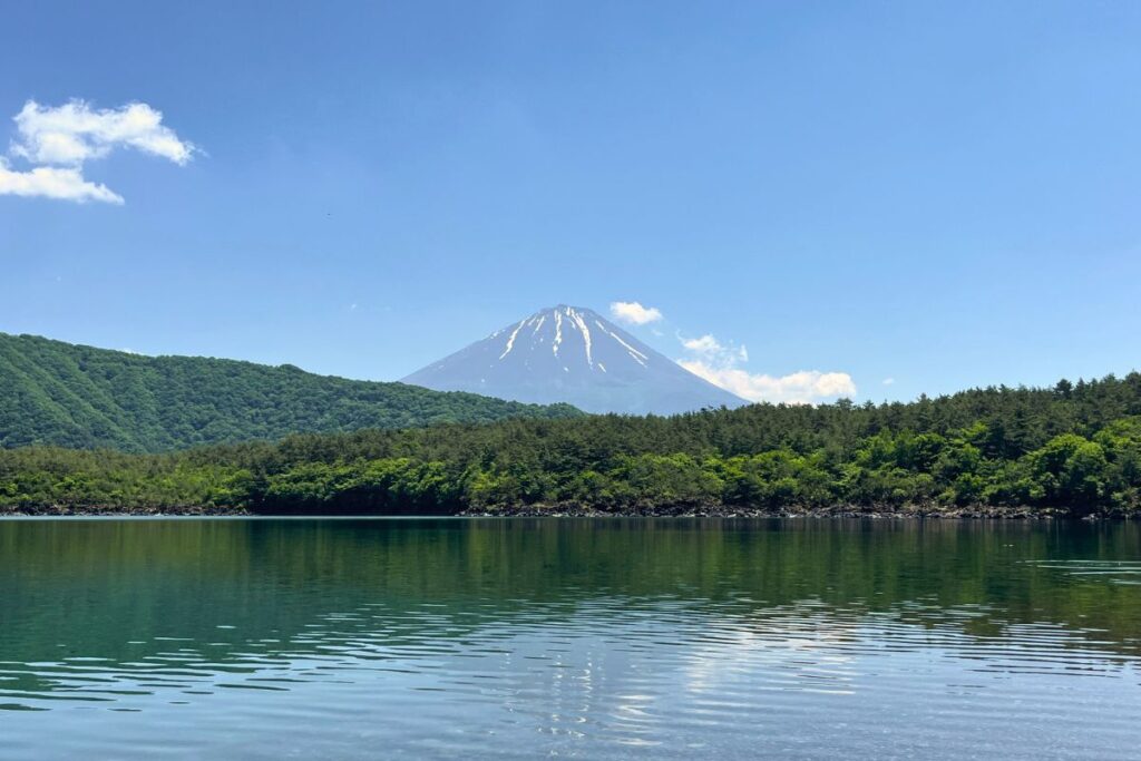 Mount Fuji beyond the shores of Lake Saiko.