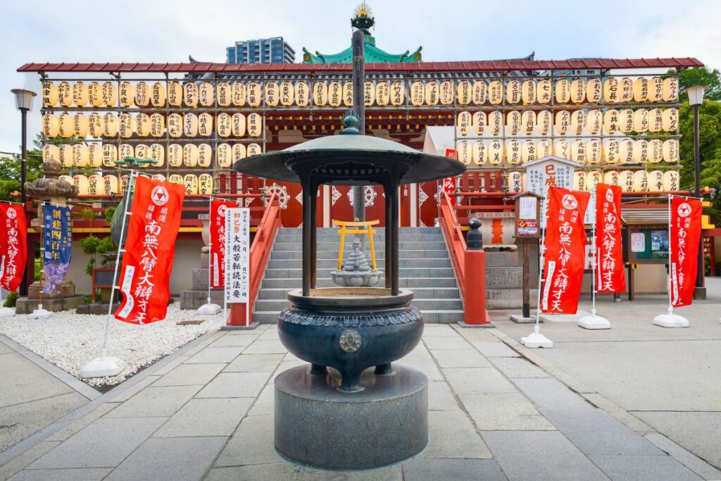 Ueno Park Temple A Japanese temple in Ueno Park surrounded by traditional lanterns.