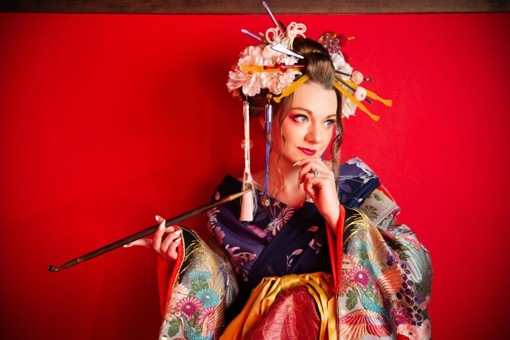 Krysti Kyoto Photoshoot Krysti dressed in a Japanese kimono, posing with traditional Japanese props.