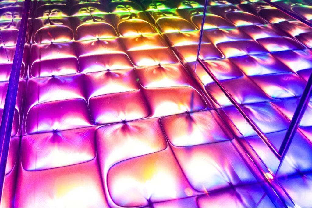 Floor covered in fluorescent gold-like liquid.