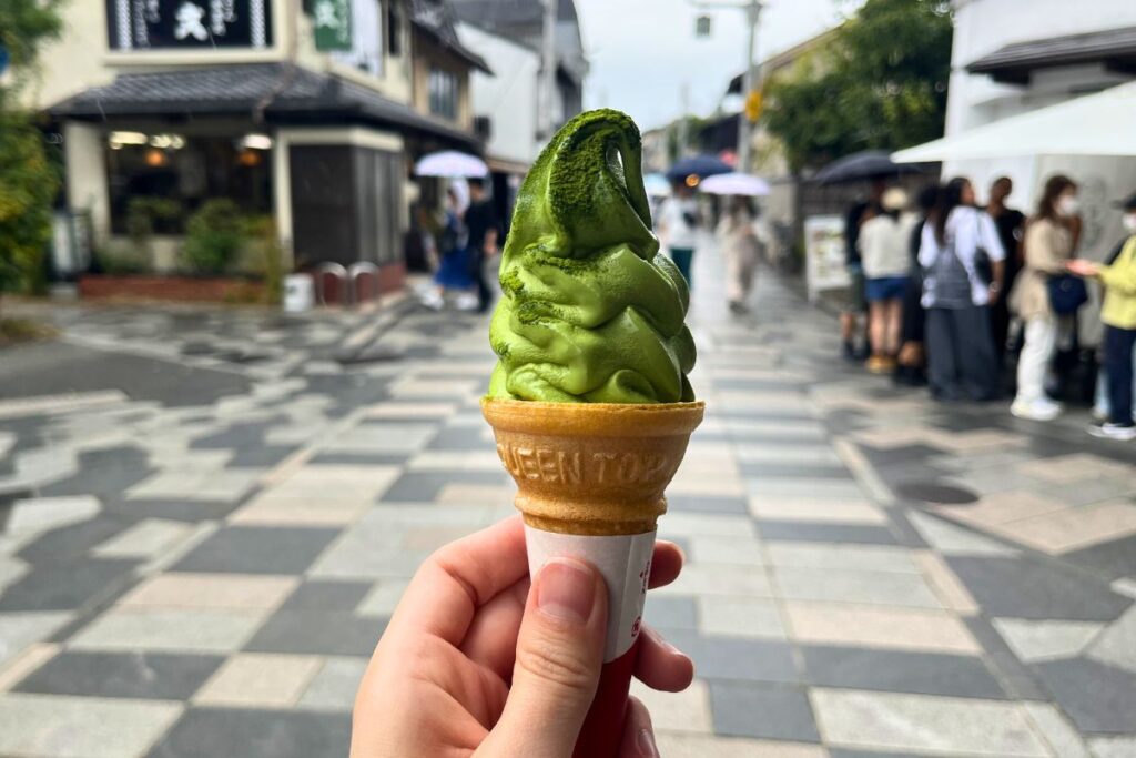 Bright green Uji matcha ice cream in a cone